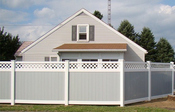 White and gray vinyl fencing